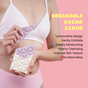 A woman in pink underwear and a white bra holds a breakable, geometric sugar scrub bar. Text on a pink background highlights its features, including gentle exfoliation, deep moisturization, and improved skin texture.