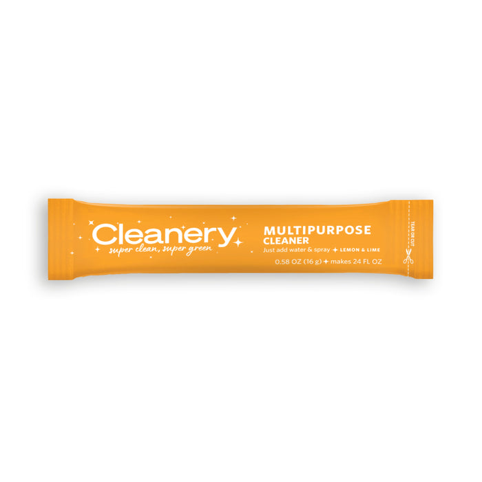 An orange Cleanery Multipurpose Cleaner packet, labeled with “super clean, super green,” lemon & lime scent, and instructions to just add water. The packet contains 0.58 oz (16g) and makes 24 fl oz.