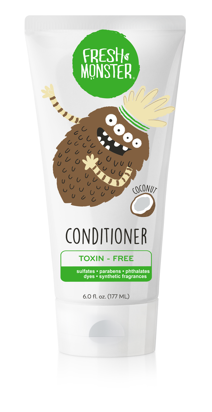 A white 6 oz tube of Fresh Monster coconut conditioner featuring a smiling, cartoon brown monster with three eyes. The label highlights that it is toxin-free, and free from sulfates, parabens, phthalates, dyes, and synthetic fragrances.
