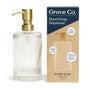 The Grove Co. Hand Soap Dispenser - Eves of Enchantment is an elegant, limited edition fluted glass design with a brushed gold stainless steel pump, perfect for Grove Co. hand soaps. It emphasizes durability and recyclability, making it ideal for matching festive scents during the holiday season.