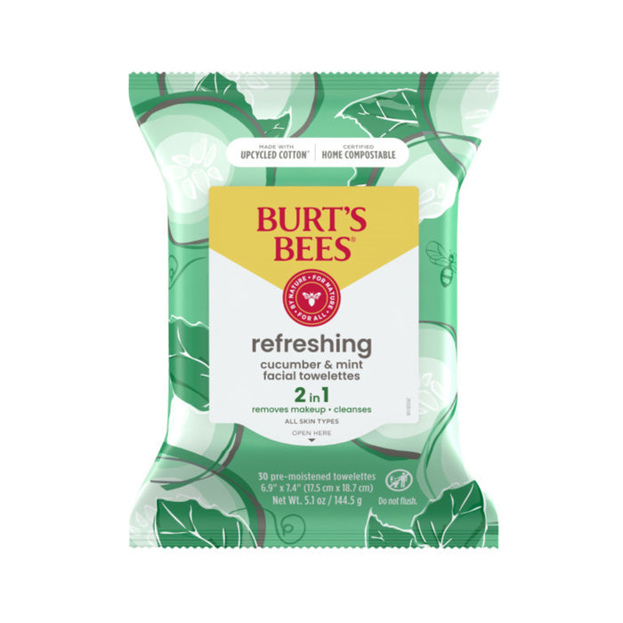 A package of Burts Bees Refreshing cucumber & mint 2-in-1 facial towelettes, featuring green leafy designs on the packaging. The pack mentions it is made with upcycled cotton and is home compostable.
