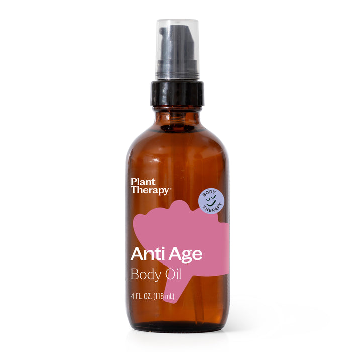 A brown glass spray bottle labeled Plant Therapy Anti Age Body Oil with a pink design and a blue Body Therapy badge on the front, containing 4 fl oz (118 mL) of product.