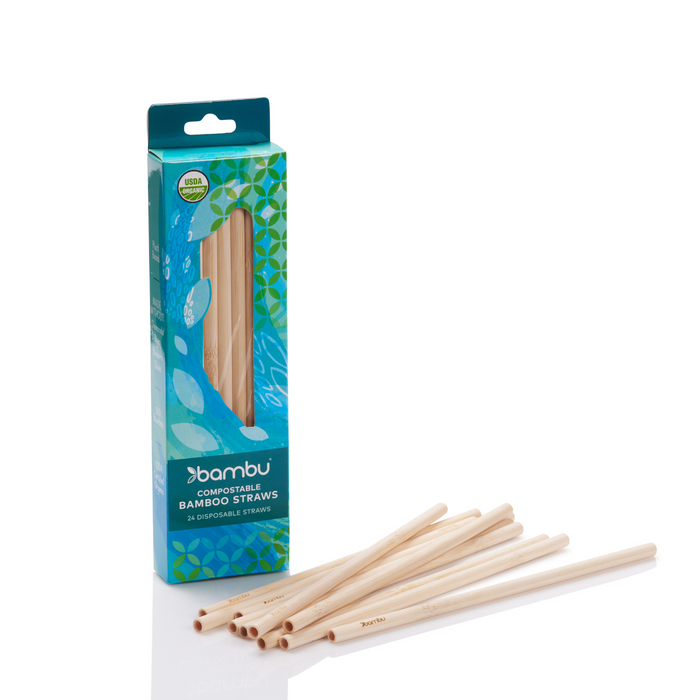 A box of Bambu compostable bamboo straws with several straws placed in front of the box on a white background. The packaging is blue and green, displaying the brand and product information.
