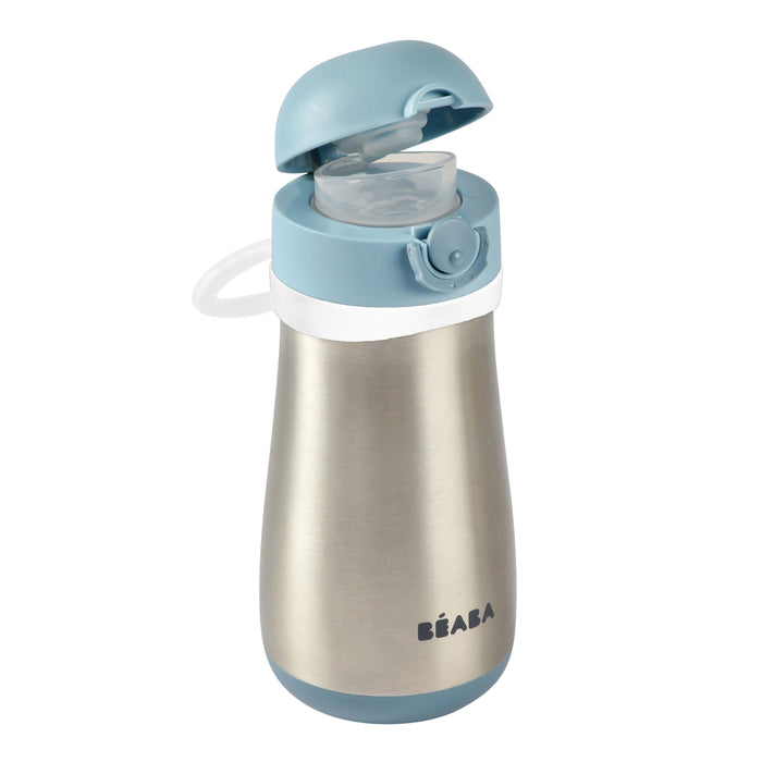 A stainless steel water bottle with a light blue lid, flip-top cap, and the BEABA logo on the front. The bottle also has a white carrying loop attached to the lid.