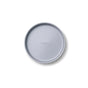 A round, light gray baking pan with slightly raised edges, viewed from above. The word Caraway is embossed in the center. The pan is set against a plain white background.