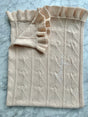 AU Baby Little Love Baby Blanket - Butter Cream in a cream-colored cable-knit heart pattern with ruffled trim, embroidered with the name Imogen.
