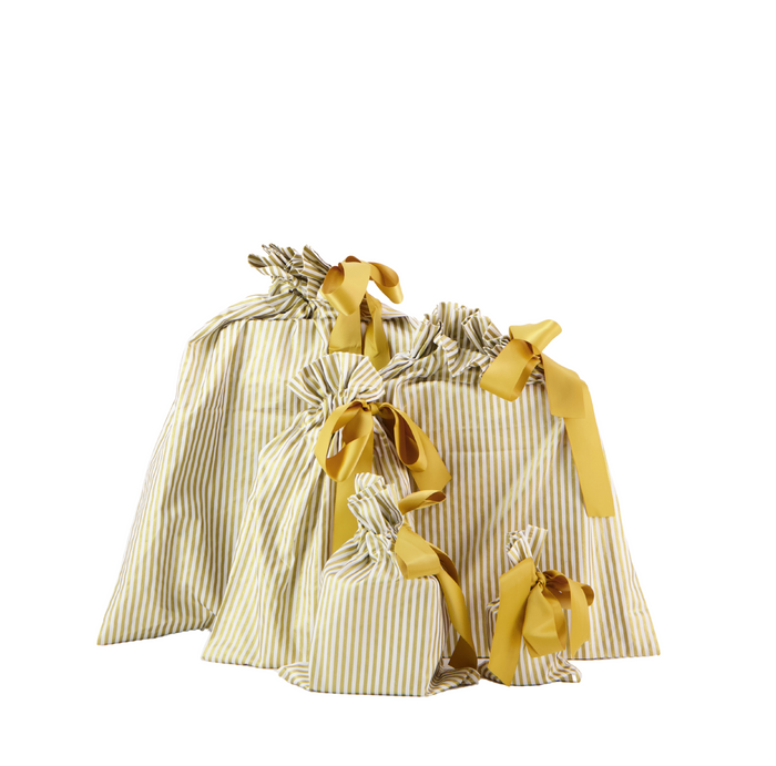 Four fabric gift bags with yellow and white vertical stripes, each tied with a yellow ribbon and arranged together against a white background. The bags vary in size.