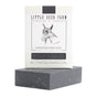 Little Seed Farm’s Activated Charcoal Facial & Body Bar, handmade in Tennessee with organic oils, is perfect for acne-prone skin and detoxifying care. Features goat-themed packaging and a sleek dark gray finish.
