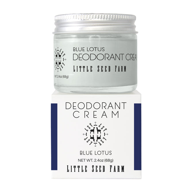 A glass jar of Little Seed Farm Deodorant Creams rests on its matching box, both showing the product name, brand logo, and a net weight of 2.4 oz (68g).