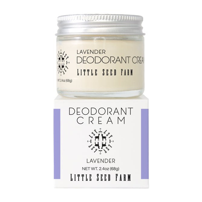 A 2.4 oz (68g) glass jar of Little Seed Farm Deodorant Creams rests on its matching box, both labeled with the brand and product name. This aluminum-free deodorant offers a natural way to stay fresh.