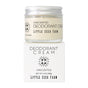 A glass jar of Little Seed Farm Deodorant Creams rests atop its white box, both featuring the brand name and product details in black text.