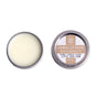 Two small round tins of Little Seed Farm Lip Salve; one open to reveal a smooth, pale balm, the other closed with a label. Made with healing botanicals and organic butters.