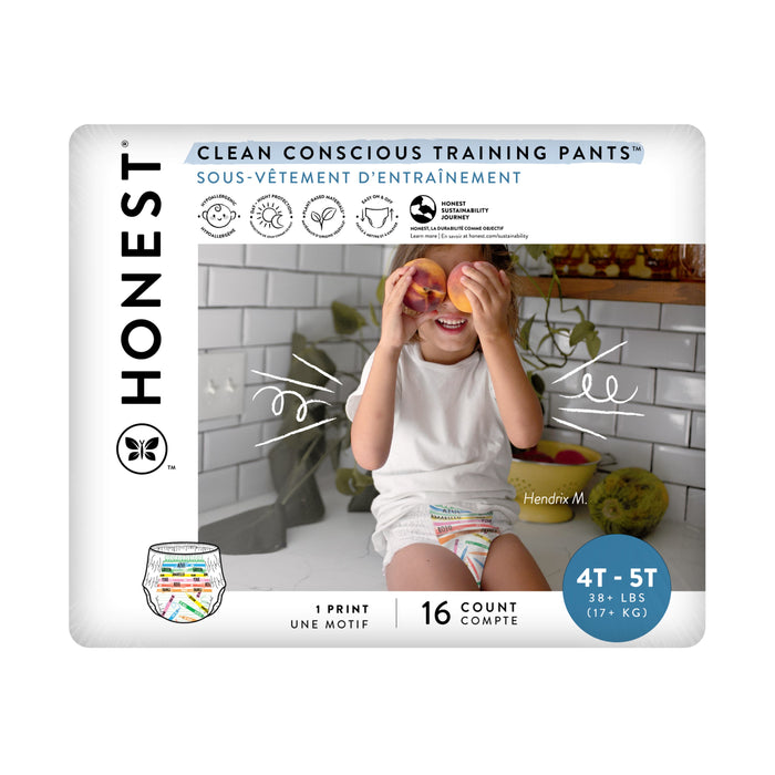 A child sits on a bathroom counter, playfully holding two peach halves over their eyes. The packaging is for Honest Clean Conscious Training Pants, size 4T-5T, 16 count, for children 38+ lbs.