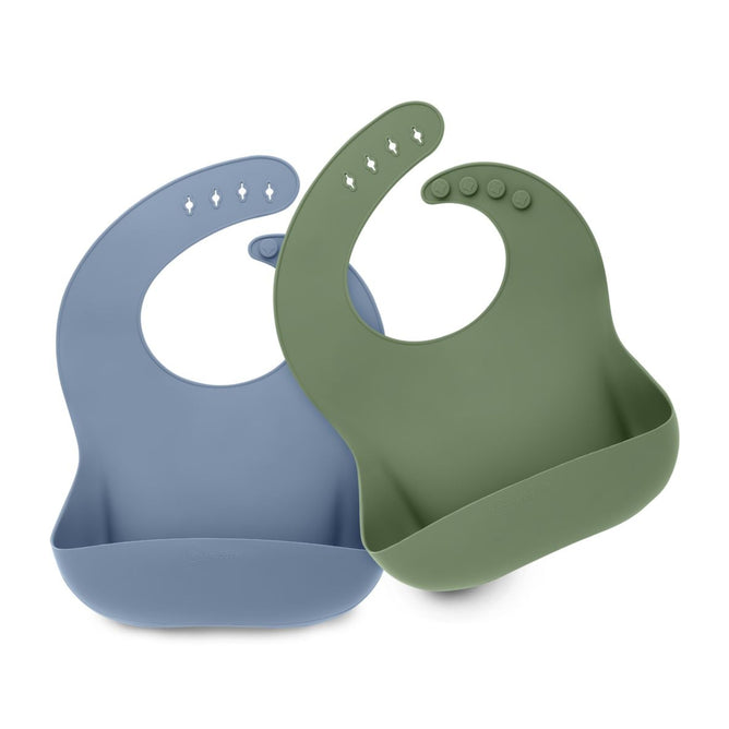 The image displays two waterproof silicone bibs by KeaBabies. One is blue, the other green, both featuring adjustable button fastenings and a wide pocket at the bottom to catch food.