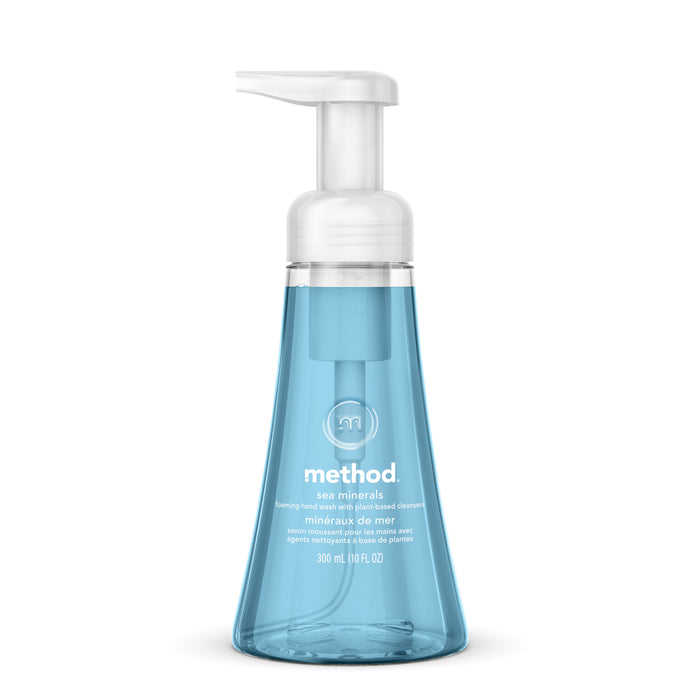 A clear bottle of Method brand foaming hand wash in sea minerals scent, filled with blue liquid and topped with a white pump dispenser. The label and logo are visible on the front.