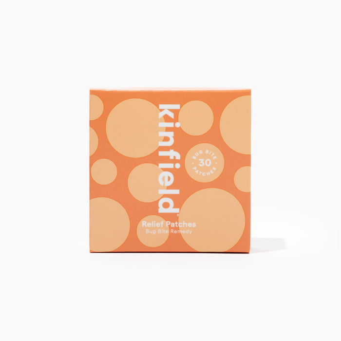 An orange box with large and small peach circles, labeled kinfield Relief Patches Bug Bite Remedy 30 Patches, set against a white background.