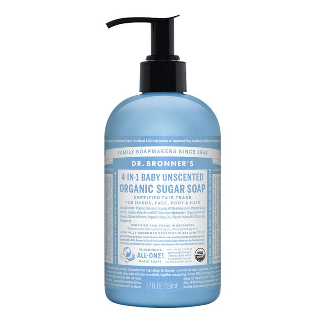A bottle of Dr. Bronners Organic Sugar Soap, Baby Unscented 4-in-1, comes with a pump dispenser and light blue packaging featuring detailed white and blue labeling. It is cruelty-free and responsibly packaged to emphasize its eco-friendly commitment.
