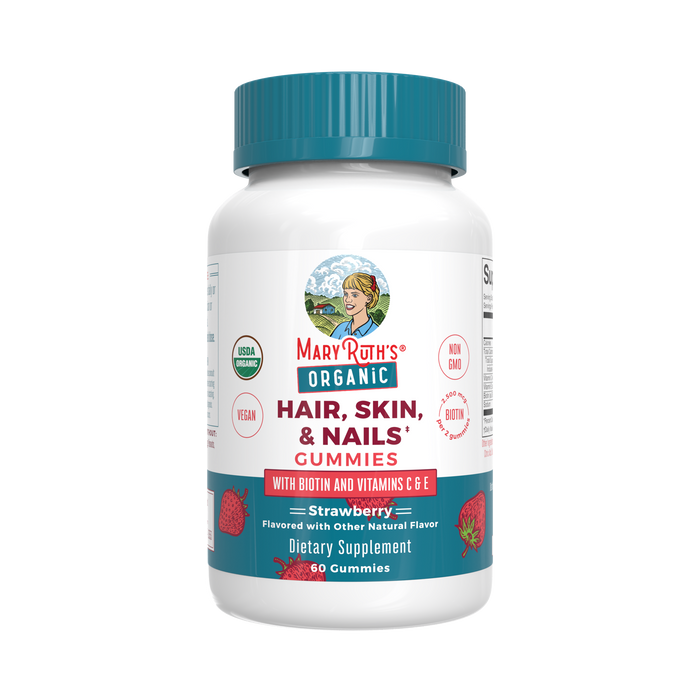 A white bottle of MaryRuth’s Organic Hair, Skin, & Nails Gummies with a teal lid. The label highlights strawberry flavor, biotin, vitamins C & E, vegan, non-GMO, and contains 60 gummies.