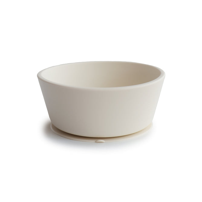 The mushie Silicone Suction Bowl is BPA-free, food-grade, and non-toxic—a safe, white round bowl with a flat base, shown on a white background. Perfect for your baby essentials.