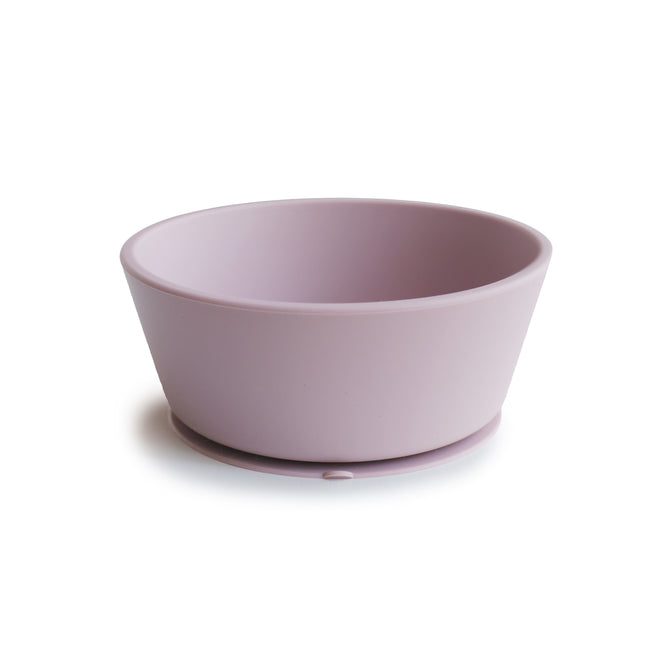 A light purple mushie Silicone Suction Bowl, made from BPA-free, food-grade silicone with smooth sides and a slightly flared rim, sits on a white background.