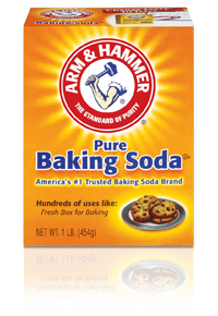 A yellow box of Arm & Hammer Pure Baking Soda with a red logo showing a muscular arm holding a hammer. Text highlights it as Americas #1 trusted brand and suitable for baking. Box size is 1 lb (454g).