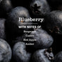 Close-up of fresh blueberries with text overlay: Blueberry with notes of Bergamot, Cassis, Red Apple, Amber—perfect for a refreshing dish soap like Mrs. Meyer's Dish Soap.