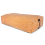 A Yoloha Yoga Cork Bolster, crafted from sustainable cork and featuring a fabric handle on one end, is displayed on a white background.