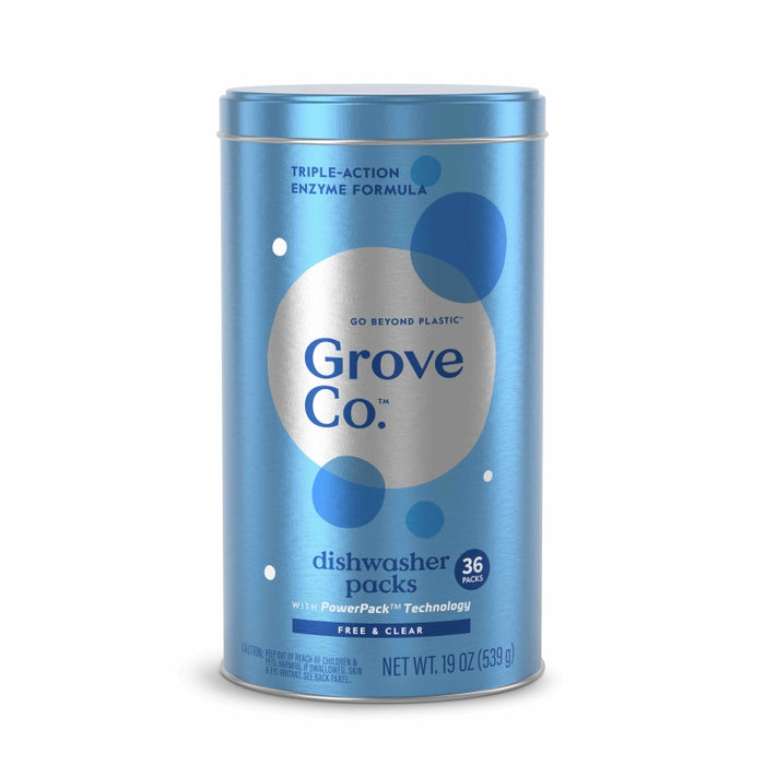 A blue cylindrical container of Grove Co. dishwasher packs, featuring Triple-Action Enzyme Formula and 36 pods on the label, with white and dark blue accents and a metallic lid.