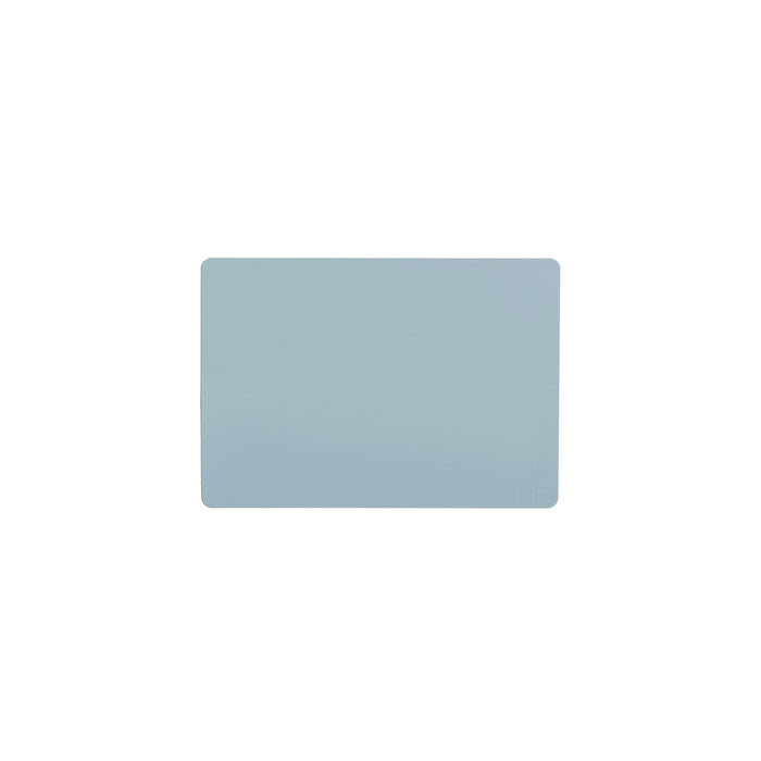 A rectangular, light blue desk mat with rounded corners is centered on a white background.