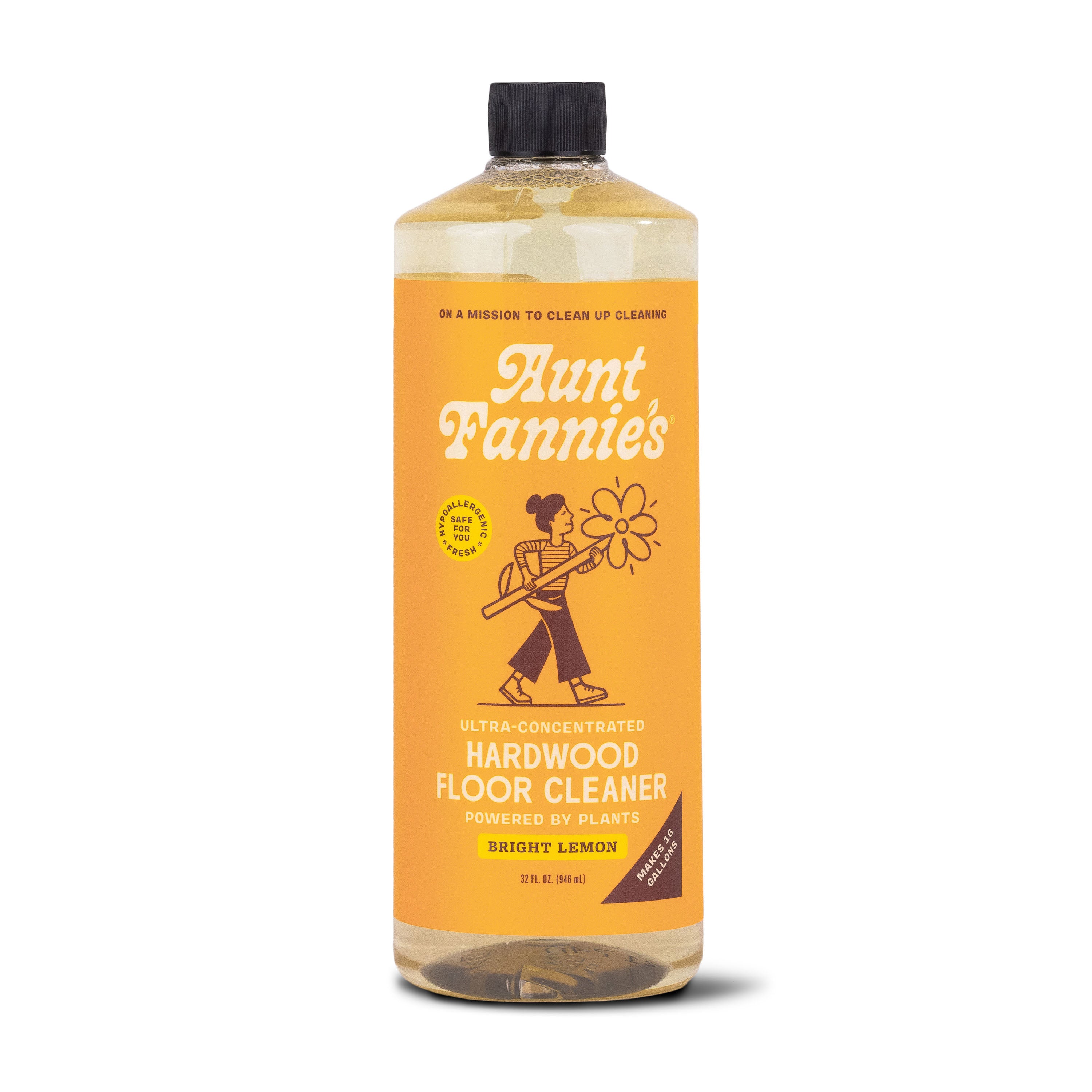 Aunt Fannies Hardwood Floor Cleaner in Bright Lemon scent offers a non-toxic, essential oil-infused formula. Packaged in a 32 fl oz bottle with an orange label featuring white text and a person carrying a large flower, it makes cleaning simple.