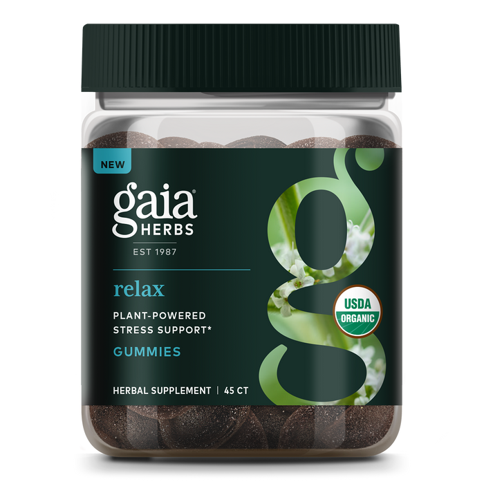 A jar of Gaia Herbs Relax Gummies, labeled as plant-powered stress support, USDA organic, with 45 herbal supplement gummies inside. The label features green and white text and a nature-themed graphic.