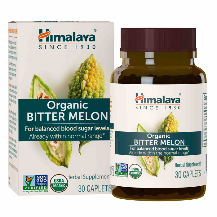 Box and bottle of Himalaya Organic Bitter Melon herbal supplement, featuring images of bitter melon and labels for Non-GMO Project Verified and USDA Organic; bottle contains 30 caplets for balanced blood sugar levels.