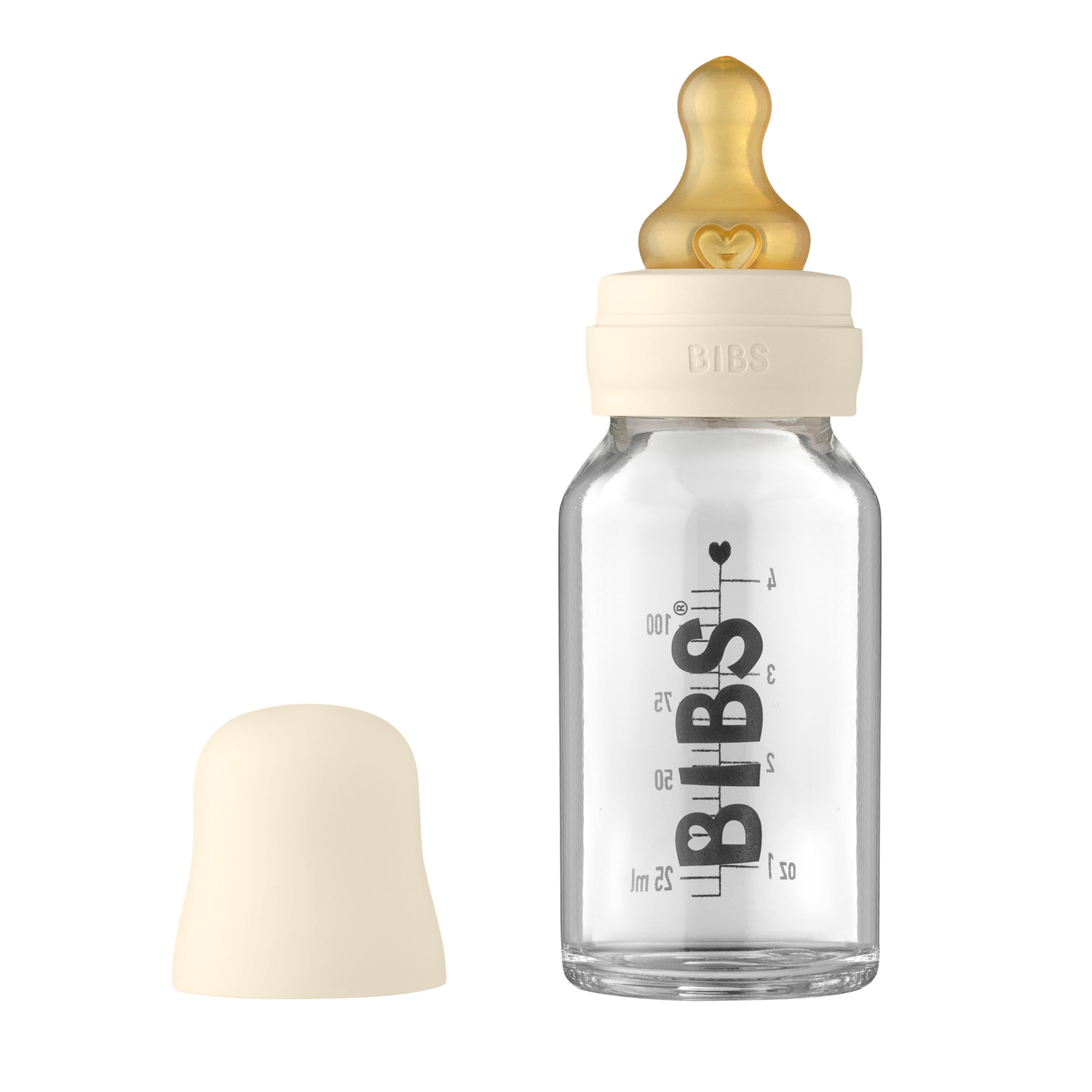 A clear glass baby bottle from BIBS, featuring a natural rubber nipple, beige cap to the left, measurement markings, and BIBS in bold black letters.