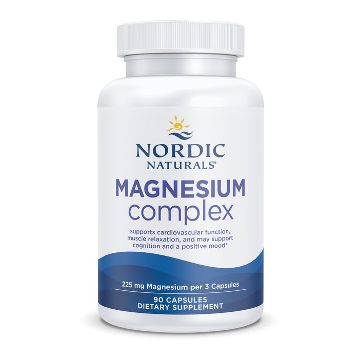 A white bottle of Nordic Naturals Magnesium Complex dietary supplement with a blue and white label, containing 90 capsules. The label highlights cardiovascular support, muscle relaxation, cognition, and mood benefits.