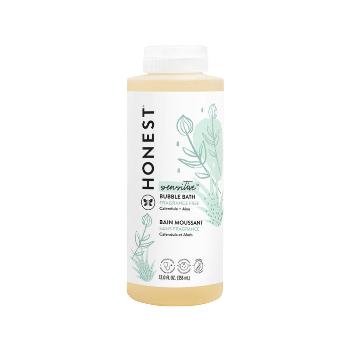 A bottle of Honest Sensitive Bubble Bath featuring a white label with green botanical illustrations and text indicating it is fragrance-free with calendula and aloe. The bottle contains 12 fl oz (355 mL).