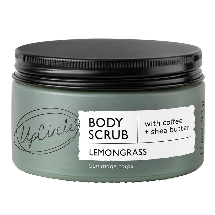 A green jar labeled UpCircle Body Scrub Lemongrass with coffee and shea butter, featuring a black screw-top lid on a white background. The jar holds 220ml (7.4 fl oz) of product.