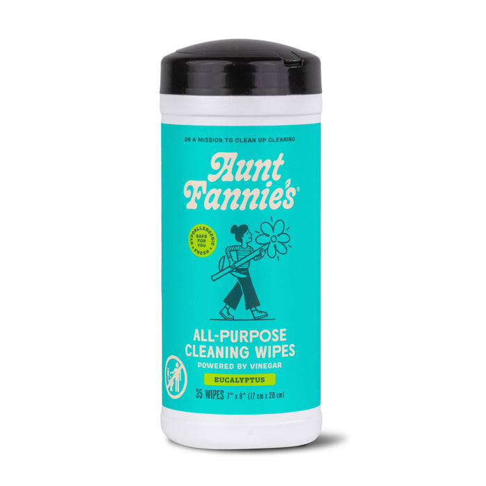 A container of Aunt Fannies All-Purpose Cleaning Wipes in eucalyptus scent, featuring a teal label with white and yellow text and an illustration of a person holding a large flower. The container holds 35 wipes.