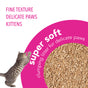 A kitten scratches at bold pink text reading Fine texture, delicate paws, clumping cat litter. Beside it is okocat Super Soft Clumping Wood Cat Litter—made from natural wood fiber for odor control and gentle on delicate paws.
