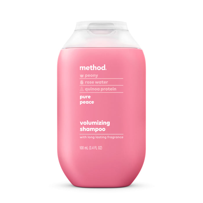 A pink bottle of Method volumizing shampoo with peony, rose water, and quinoa protein, labeled pure peace. The bottle has a white cap and contains 100 mL (3.4 fl oz).
