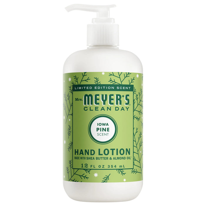 A white pump bottle of Mrs. Meyer’s Hand Lotion in Iowa Pine with a green label featuring evergreen branch illustrations.
