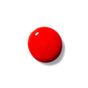 A single, round blob of glossy bright red liquid, possibly nail polish or paint, on a plain white background with a small reflection of light on its surface.