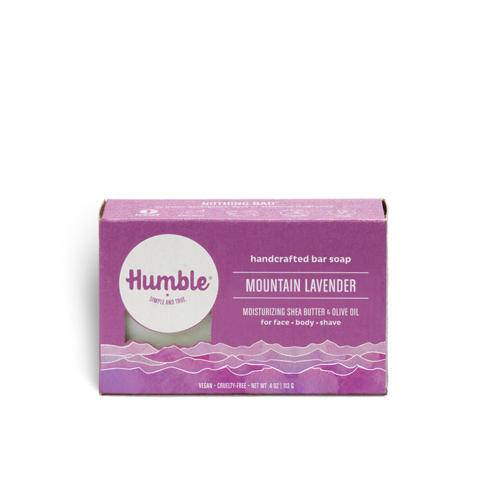 A purple box of Humble handcrafted bar soap in the Mountain Lavender scent, featuring moisturizing shea butter and olive oil. The packaging notes it is vegan, cruelty-free, and suitable for face, body, and shaving.