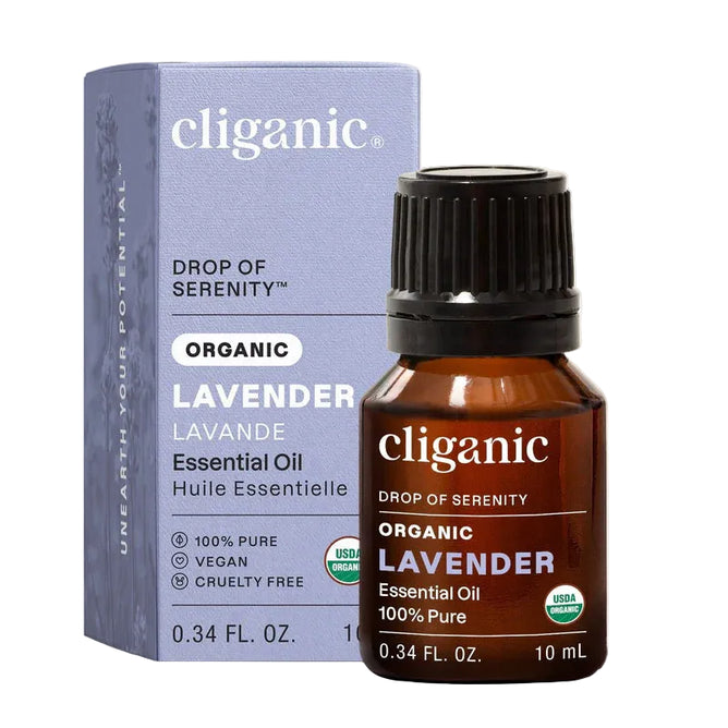 A bottle of Cliganic Organic Lavender Essential Oil - Drop of Serenity (10 ml) sits in front of its box, showcasing features such as 100% pure, vegan, cruelty-free, and USDA organic certification—making it the perfect choice for aromatherapy enthusiasts seeking a premium organic essential oil.