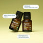 Two brown bottles labeled Cliganic Organic Lemongrass Essential Oil - Drop of Purification sit against a yellow background, with text bubbles stating: Repels mosquitoes naturally with this powerful mosquito repellent, neutralizes odors, and refreshes the environment using pure lemongrass oil.