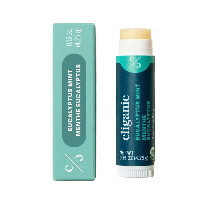 A tube of Cliganic Organic Lip Balm stands beside its matching box, both featuring product details and a green color scheme.