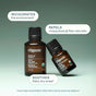 Two brown bottles of Cliganic Organic Tea Tree Essential Oil - Boost of Clarity are displayed, with text highlighting its benefits: invigorates the environment, acts as a natural mosquito and fly repellent, and soothes a flaky, dry scalp. A note recommends diluting before use for best results in organic aromatherapy.