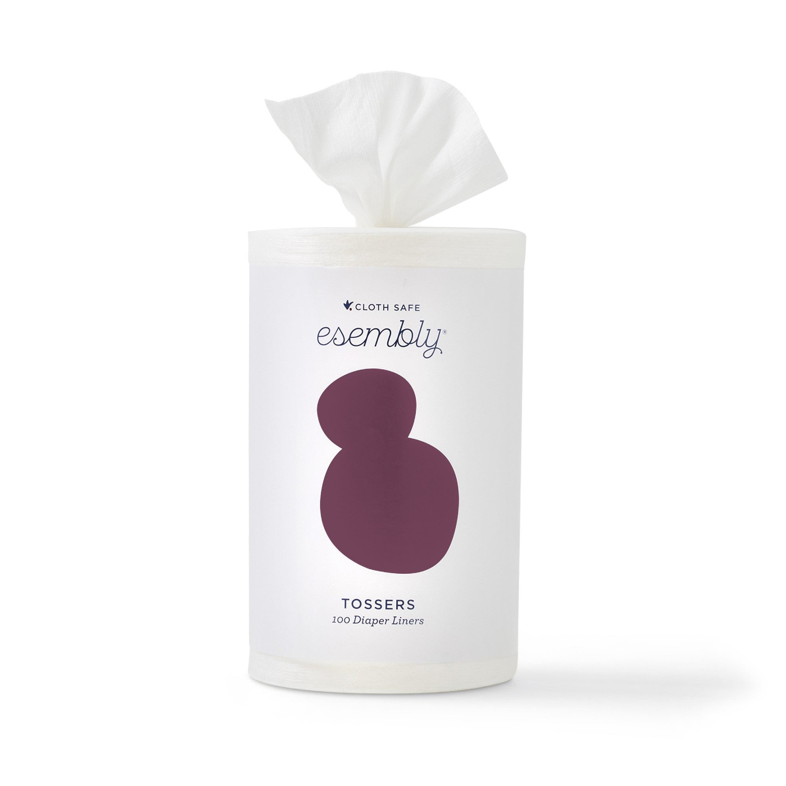 A cylindrical container labeled Esembly Baby Tossers Cloth Diaper Liners holds 100 disposable liners. The mostly white design with a purple abstract shape reveals a liner peeking out, blending practicality with style for modern parenting.