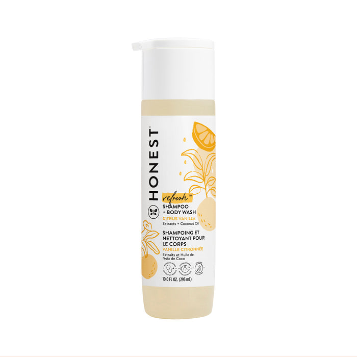 A bottle of Honest brand baby shampoo and body wash in Citrus Vanilla scent, featuring a white pump top and yellow citrus illustrations on the label. The bottle contains 10 fluid ounces (295 mL).
