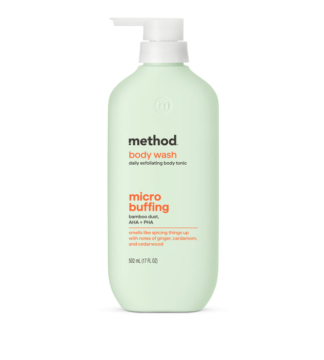 A mint green bottle of method Micro Buffing Body Wash with a white pump, labeled cruelty free, daily exfoliating body tonic with bamboo exfoliant, AHA + PHA, and scents of ginger, cardamom, and cinnamon.