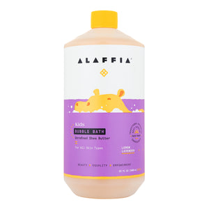A bottle of Alaffia Kids Bubble Bath gently cleanses with fair trade shea butter, featuring a label with a yellow hippo in purple water and playful white bubbles. The peach bottle is topped with a cheerful yellow cap.